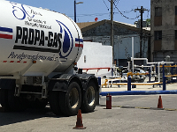 PHOTO OF LPG TANKER TRUCK UNLOADING INTO BURIED TANK